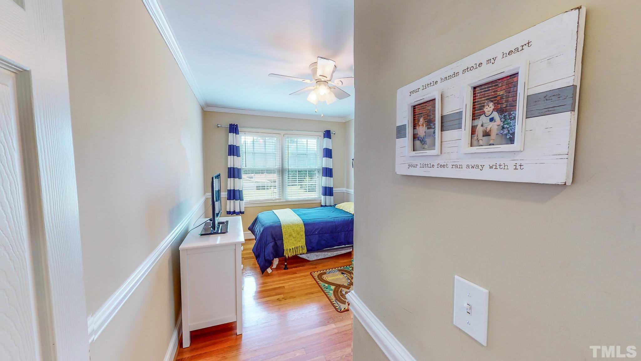 650 Younger Roxboro, NC 27573 - Photo 29 of 42 a view of a hallway with workspace and wooden floor