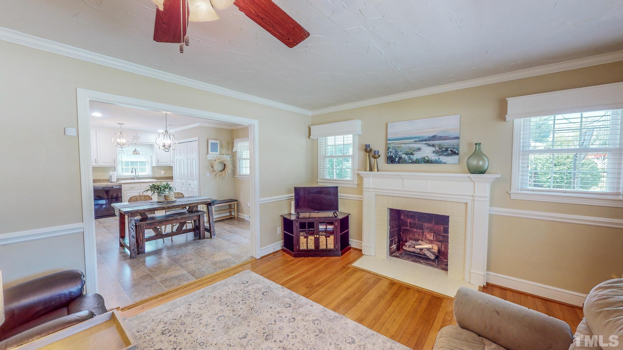 650 Younger Roxboro, NC 27573 - Photo 3 of 42 a living room with furniture and a fireplace