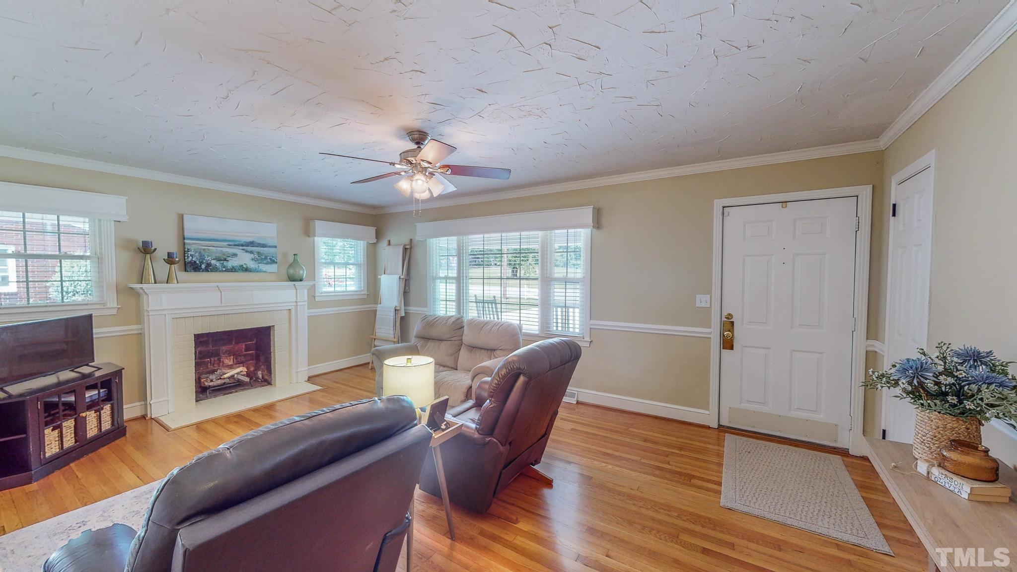 650 Younger Roxboro, NC 27573 - Photo 36 of 42 a living room with furniture and a fireplace