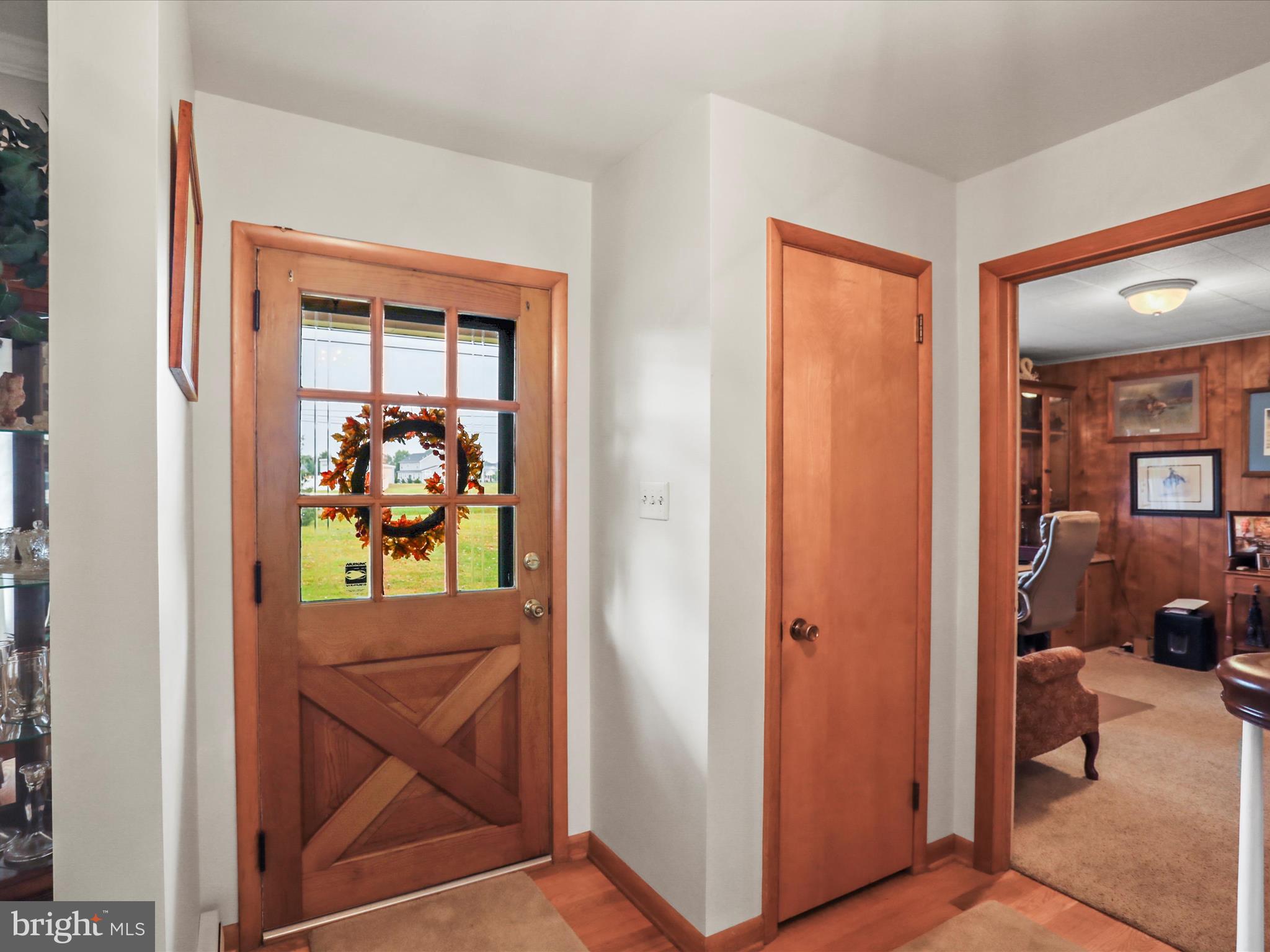 3211 Centennial Road Hanover, PA 17331 - Photo 13 of 70 Entryway with coat closet - Hardwood Floors