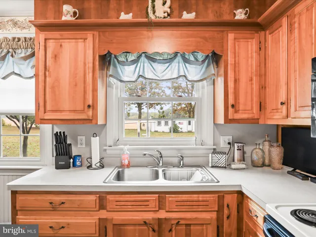 a living room with furniture or couch and a window