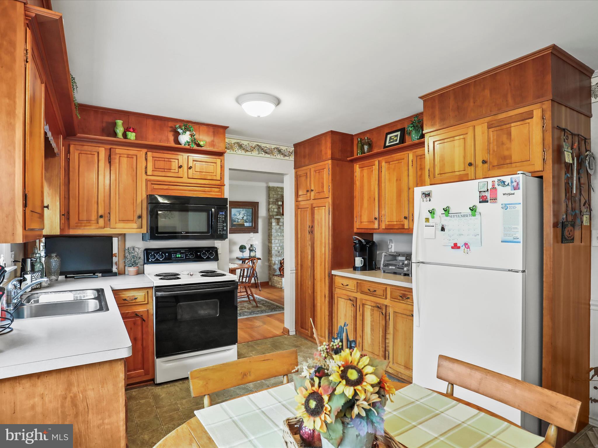 3211 Centennial Road Hanover, PA 17331 - Photo 28 of 70 a kitchen with stainless steel appliances a stove a sink refrigerator and a microwave