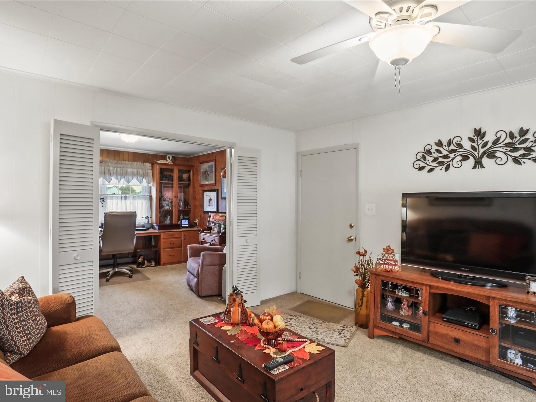 3211 Centennial Road Hanover, PA 17331 - Photo 30 of 70 a living room with furniture and a flat screen tv