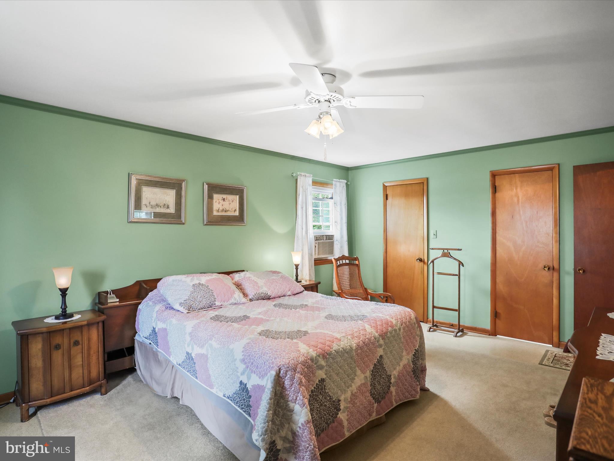 3211 Centennial Road Hanover, PA 17331 - Photo 41 of 70 a bedroom with a bed and a chandelier