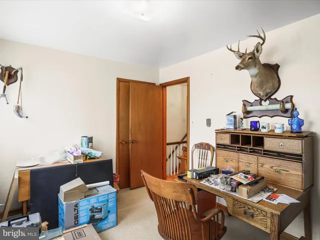 a front view of a house with a big yard