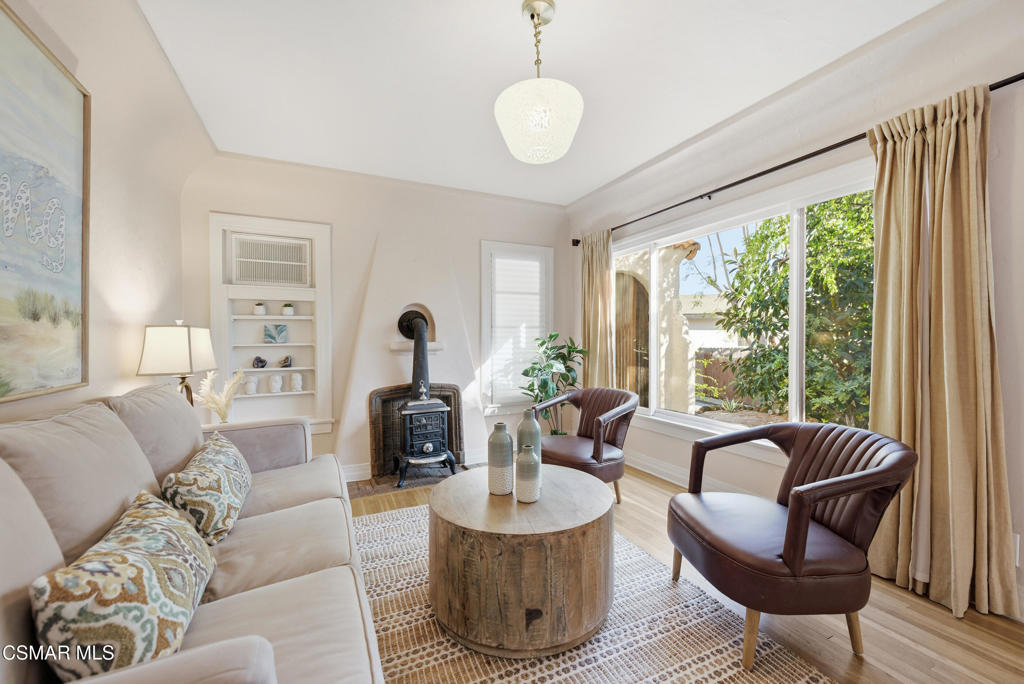 9160 Huston Road Chatsworth, CA 91311 - Photo 12 of 32 a living room with furniture and a large window