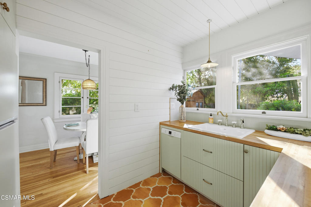 9160 Huston Road Chatsworth, CA 91311 - Photo 14 of 32 a bathroom with a sink and a window
