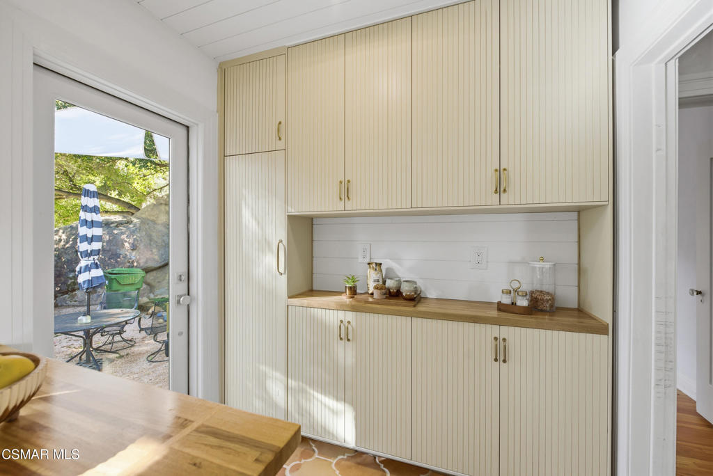9160 Huston Road Chatsworth, CA 91311 - Photo 16 of 32 a kitchen with a sink and cabinets