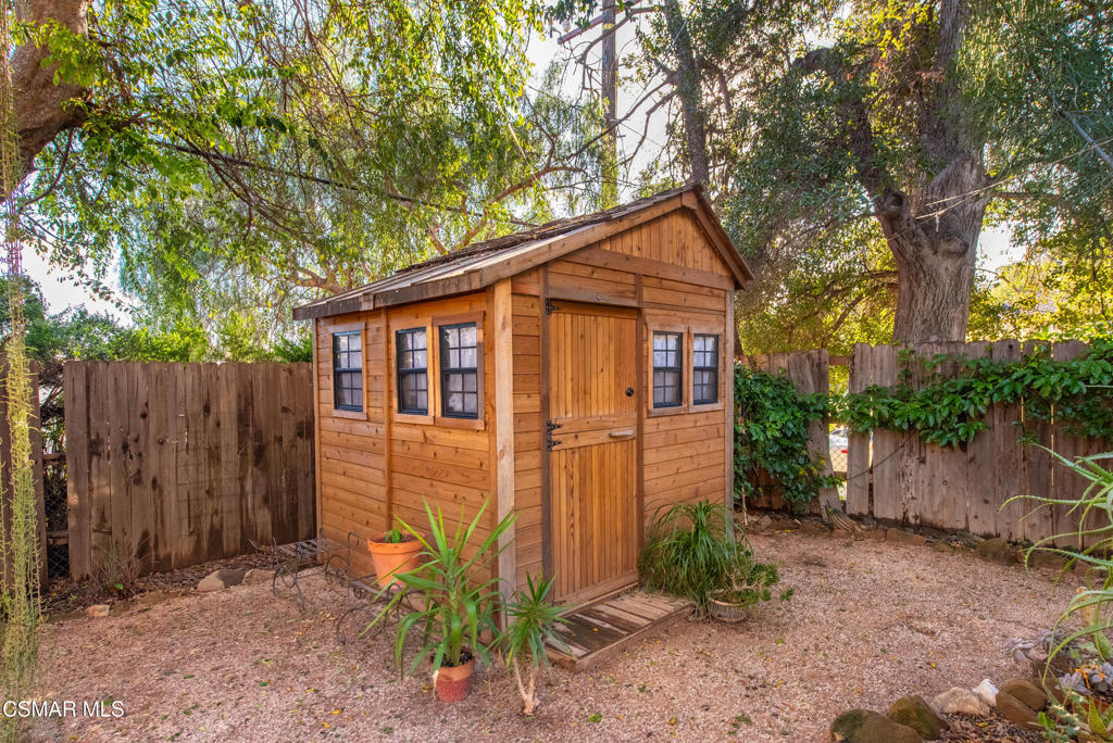 9160 Huston Road Chatsworth, CA 91311 - Photo 24 of 32 a front view of a house with garden
