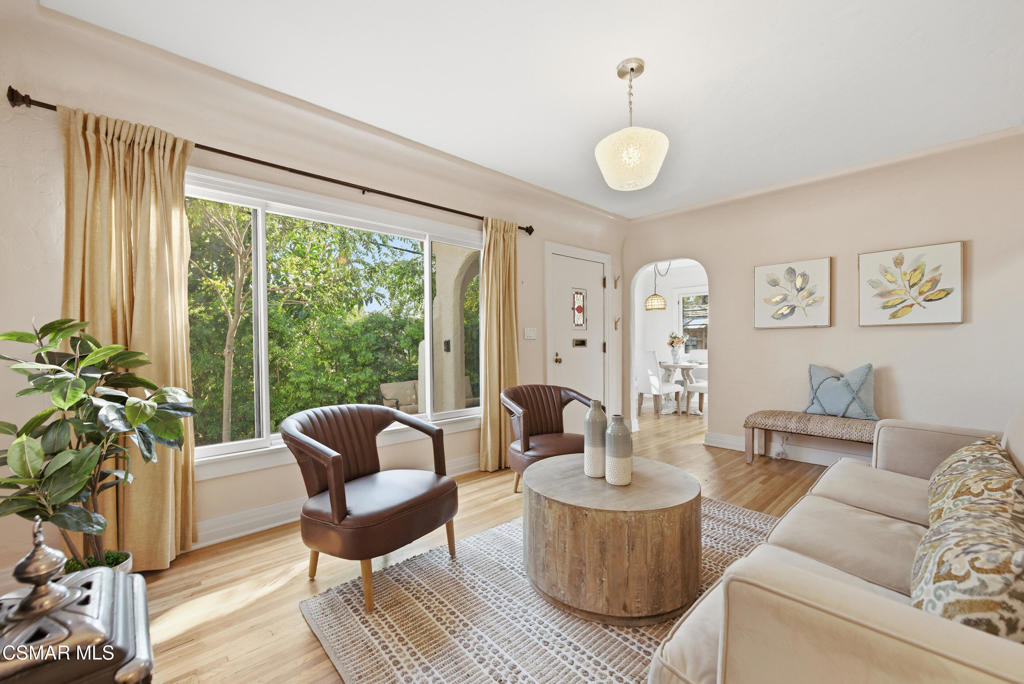 9160 Huston Road Chatsworth, CA 91311 - Photo 4 of 32 a living room with furniture and a large window