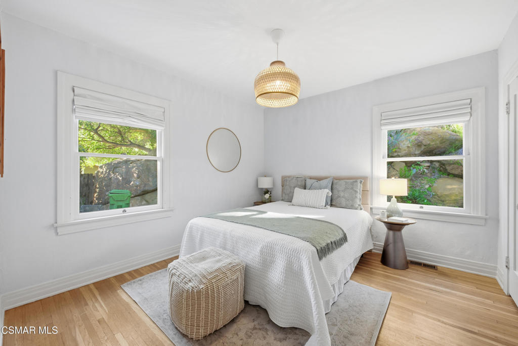 9160 Huston Road Chatsworth, CA 91311 - Photo 5 of 32 a bedroom with a bed and a window