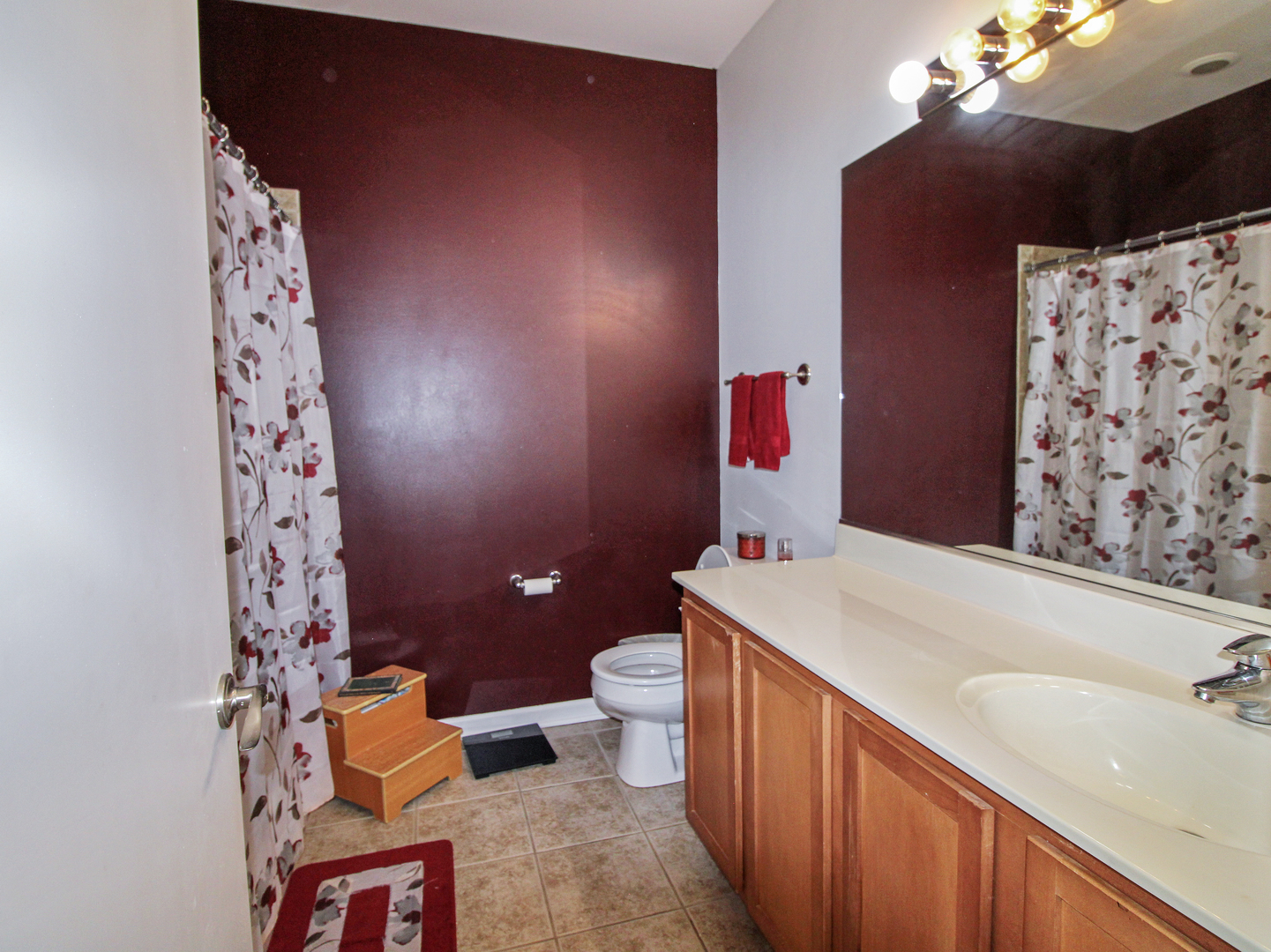 2409 West 32nd Place Chicago, IL 60608 - Photo 12 of 17 a bathroom with a sink toilet and shower