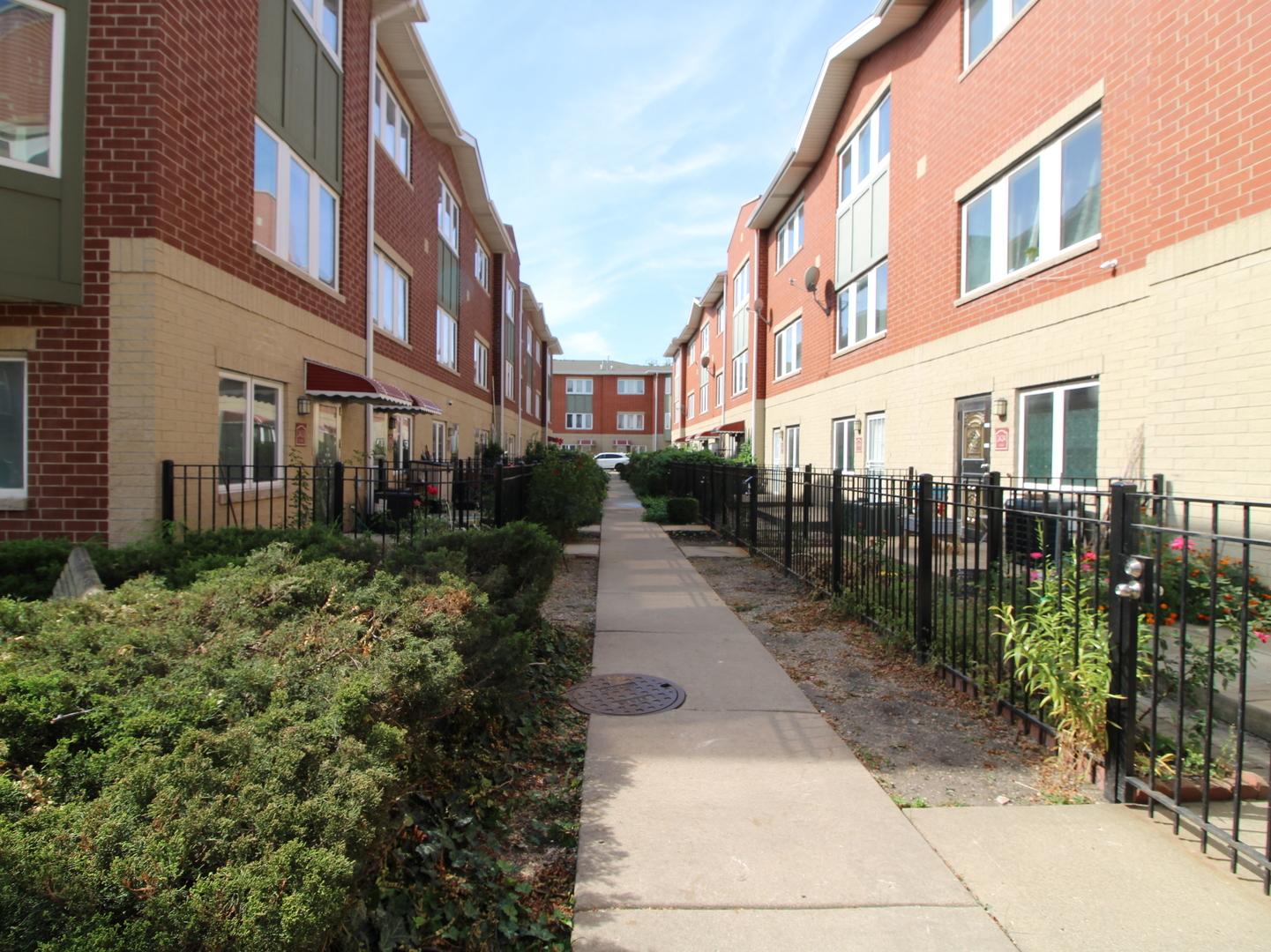 2409 West 32nd Place Chicago, IL 60608 - Photo 16 of 17 a view of a pathway both side of building
