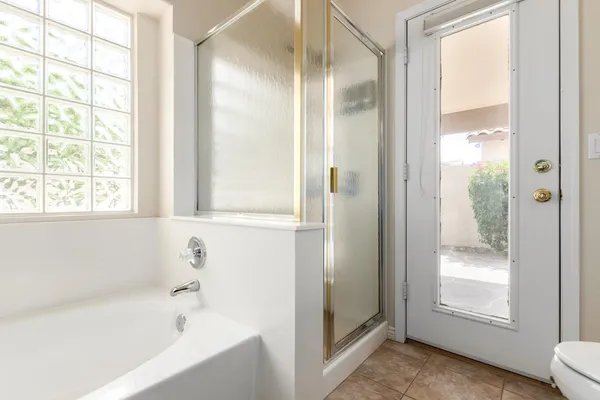 a bathroom with a sink double vanity and a mirror