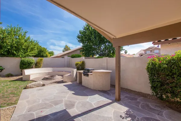 a front view of a house with patio