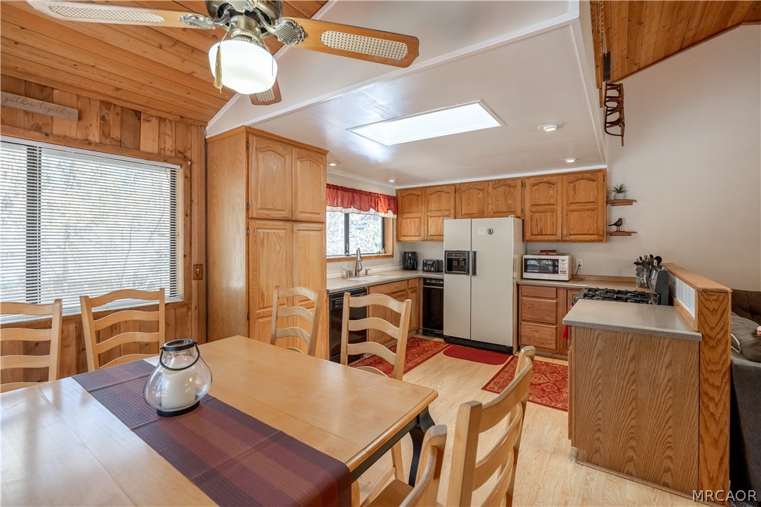 42324 Paramount Road Big Bear Lake, CA 92315 - Photo 12 of 50 a kitchen with a sink appliances and cabinets