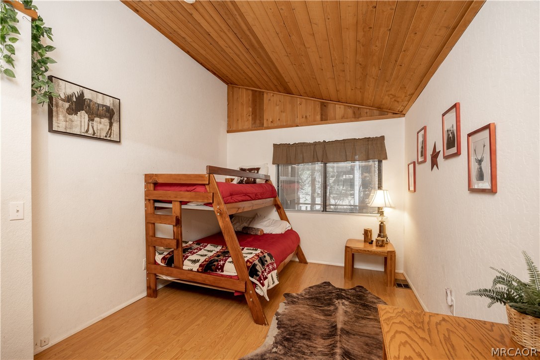 42324 Paramount Road Big Bear Lake, CA 92315 - Photo 35 of 50 a bedroom with furniture and a couch
