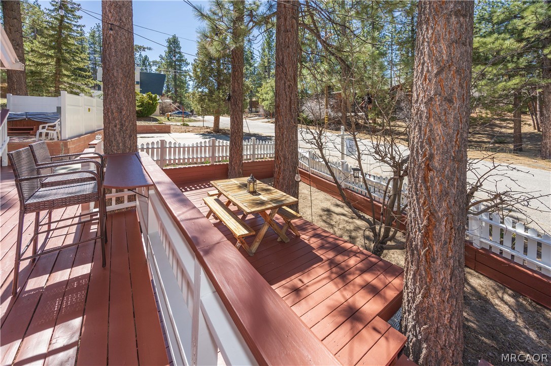 42324 Paramount Road Big Bear Lake, CA 92315 - Photo 43 of 50 a view of a balcony with mountain view and wooden floor