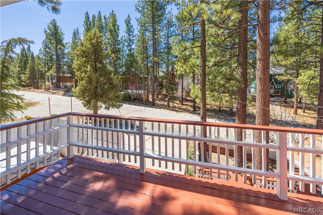 42324 Paramount Road Big Bear Lake, CA 92315 - Photo 47 of 50 a view of a wooden street from a balcony