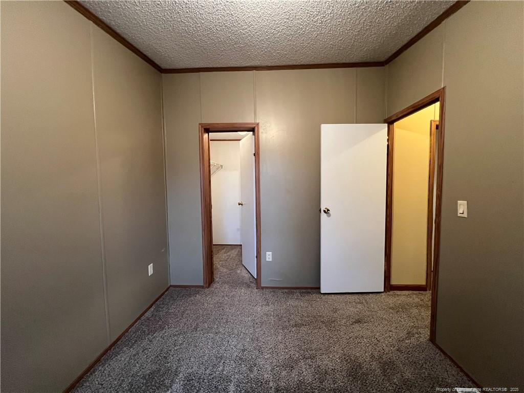 175 Travis Drive Cameron, NC 28326 - Photo 13 of 25 a view of an empty room and a window