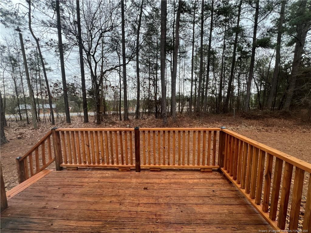175 Travis Drive Cameron, NC 28326 - Photo 24 of 25 a balcony with wooden floor