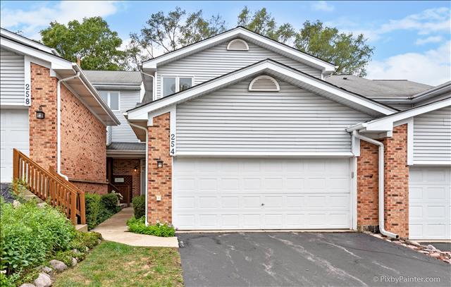 254 Charlotte Court Cary, IL 60013 - Photo 2 of 30 a view of a white house