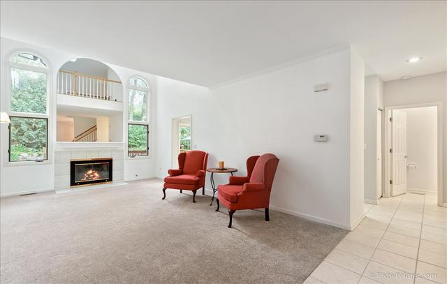254 Charlotte Court Cary, IL 60013 - Photo 11 of 30 a view of a livingroom with a fireplace