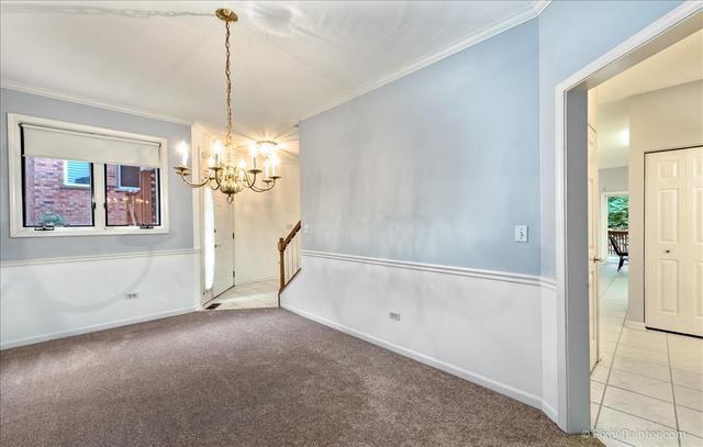 254 Charlotte Court Cary, IL 60013 - Photo 14 of 30 a view of a room with cabinet and entryway