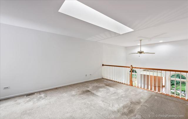 254 Charlotte Court Cary, IL 60013 - Photo 28 of 30 a view of an empty room with a window