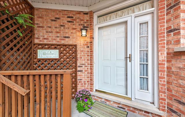 254 Charlotte Court Cary, IL 60013 - Photo 4 of 30 a view of front door of house
