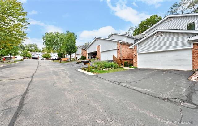 254 Charlotte Court Cary, IL 60013 - Photo 8 of 30 front view of a house with a street