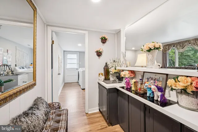 a living room with furniture and a rug