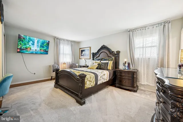 a bed room with a bed and a couch