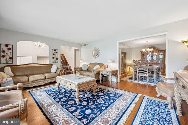 a living room with furniture rug and a rug