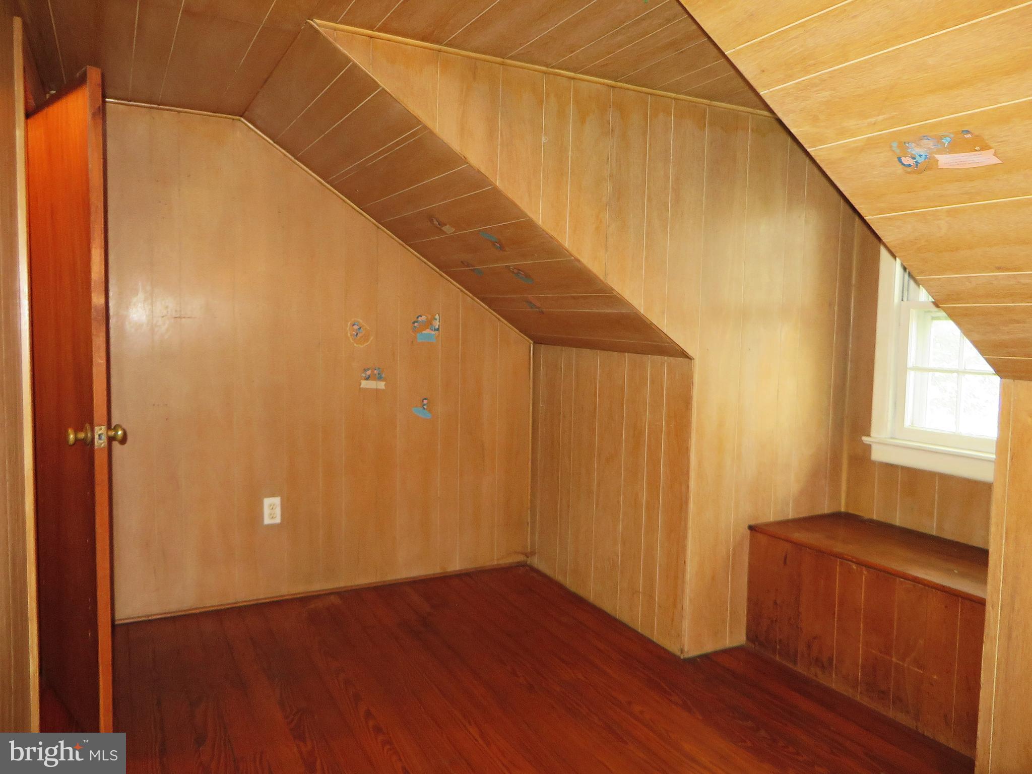 109 Chestnut Street Lititz, PA 17543 - Photo 13 of 15 a view of a room with wooden floor and brick walls