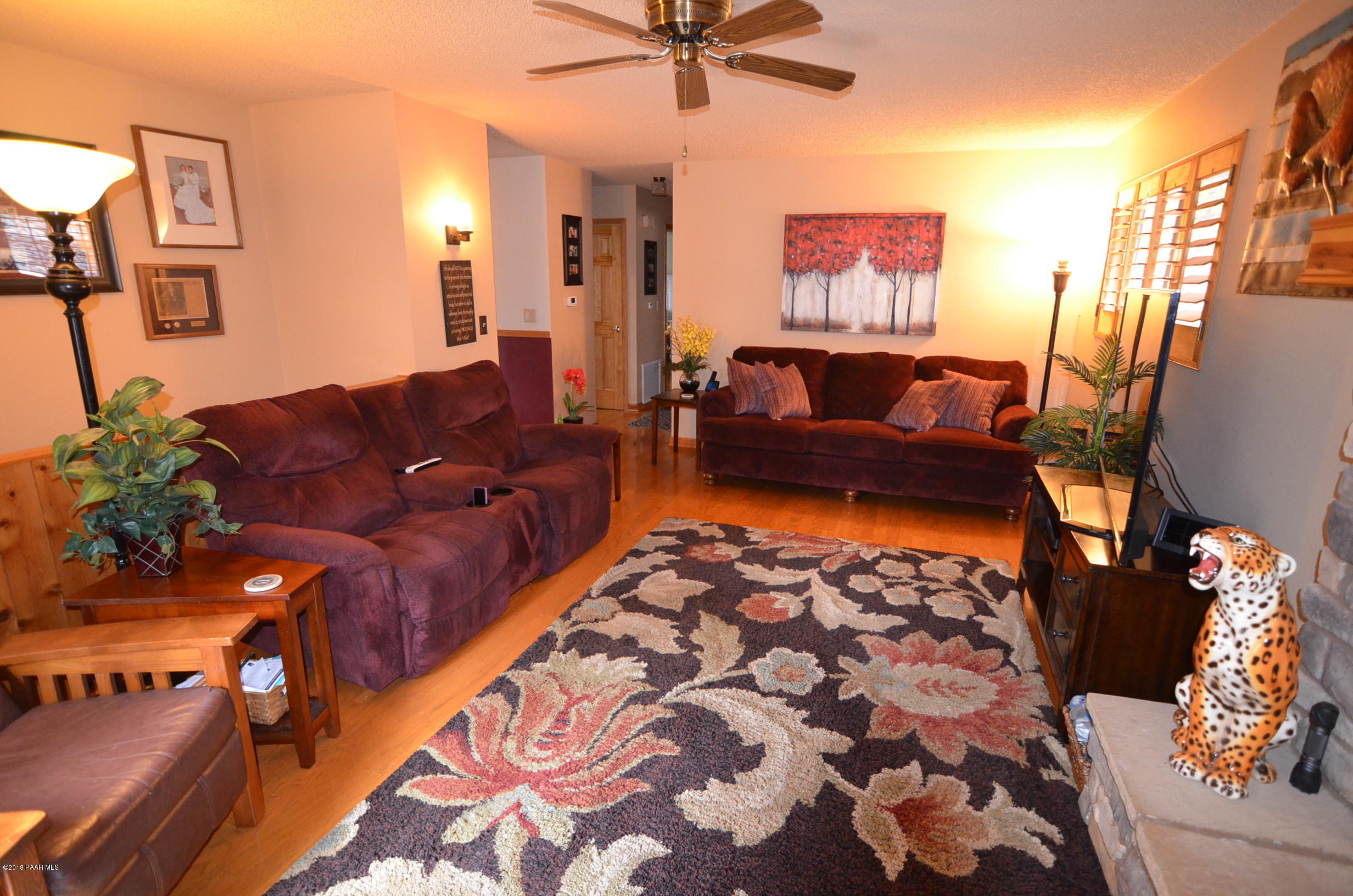 1251 Tanglewood Road Prescott, AZ 86303 - Photo 16 of 39 a living room with furniture and a rug