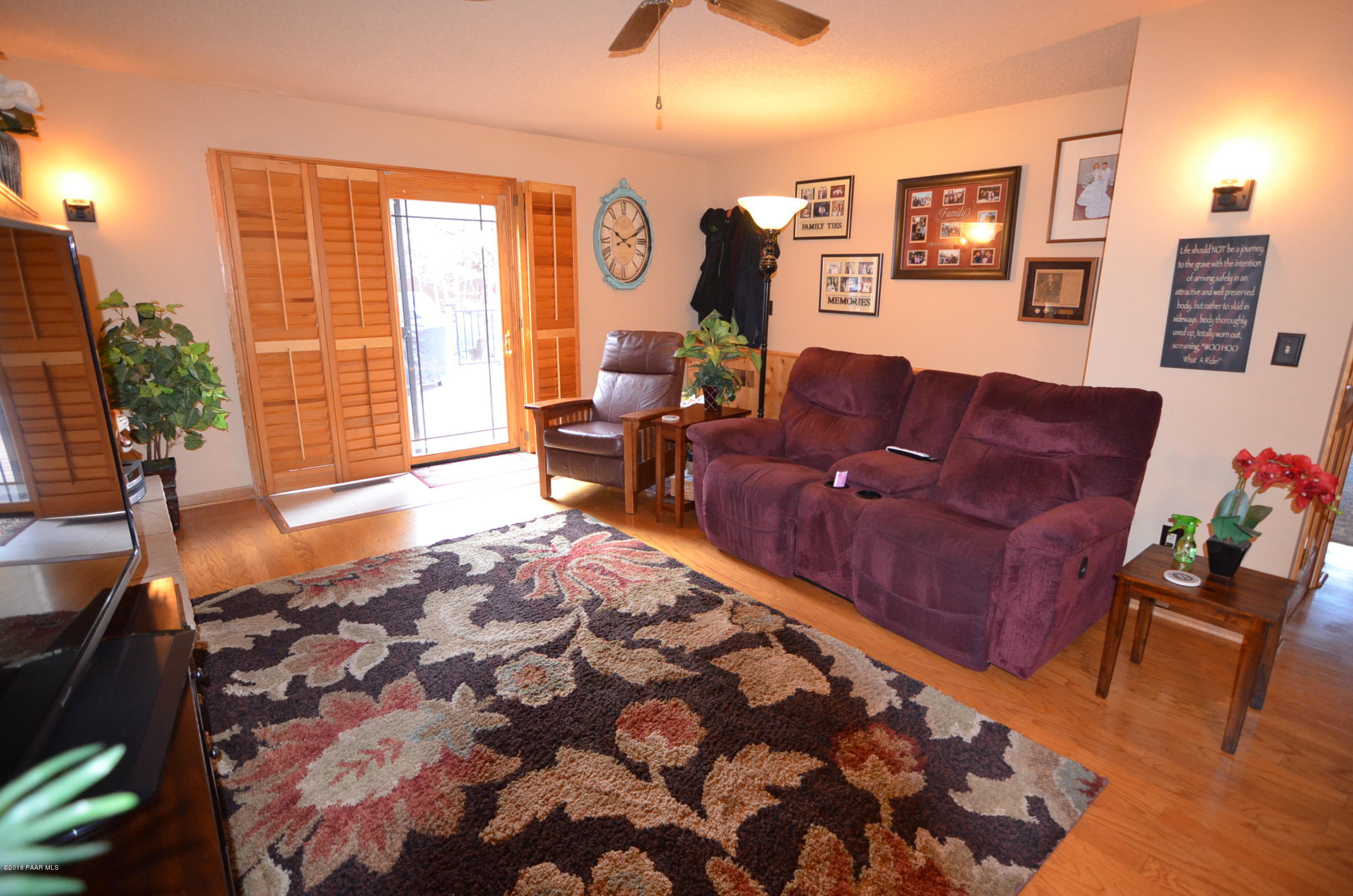 1251 Tanglewood Road Prescott, AZ 86303 - Photo 18 of 39 a living room with furniture and wooden floor