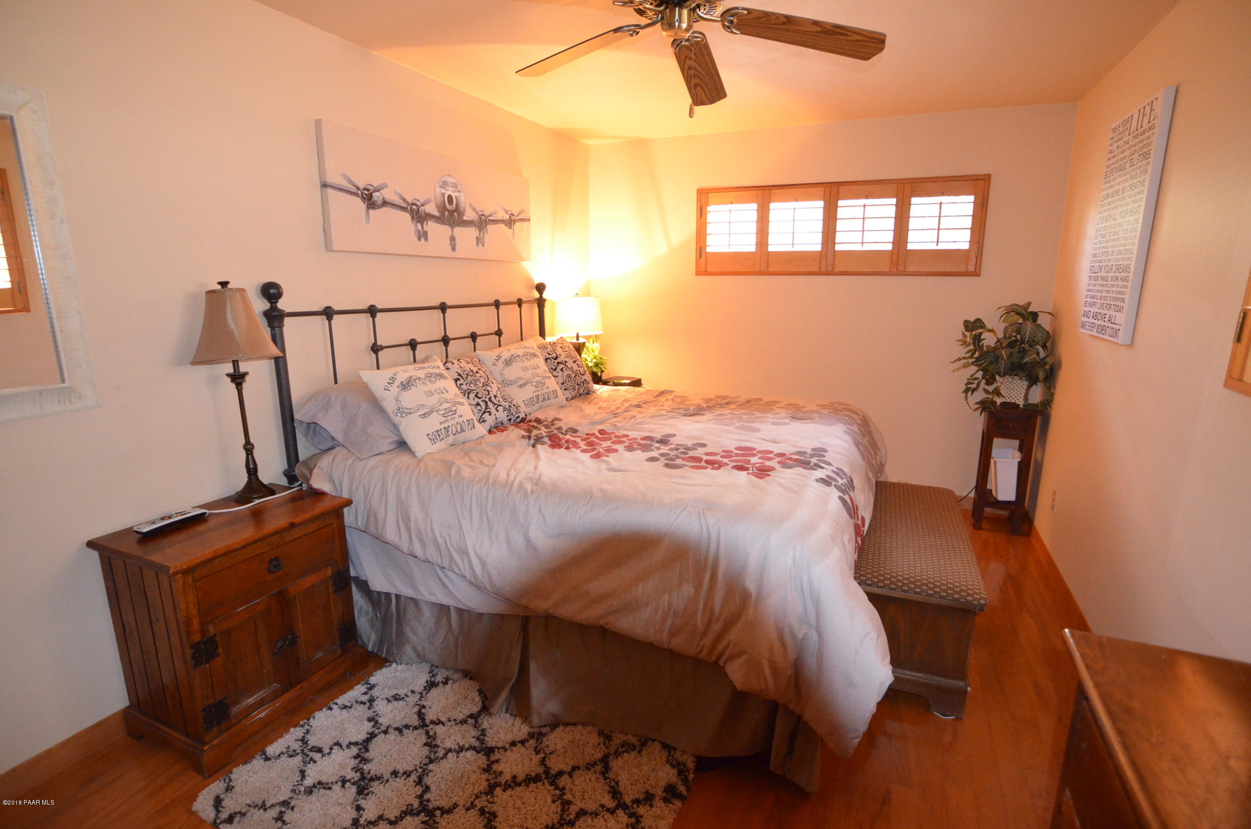 1251 Tanglewood Road Prescott, AZ 86303 - Photo 25 of 39 a bed sitting in a bedroom next to a window
