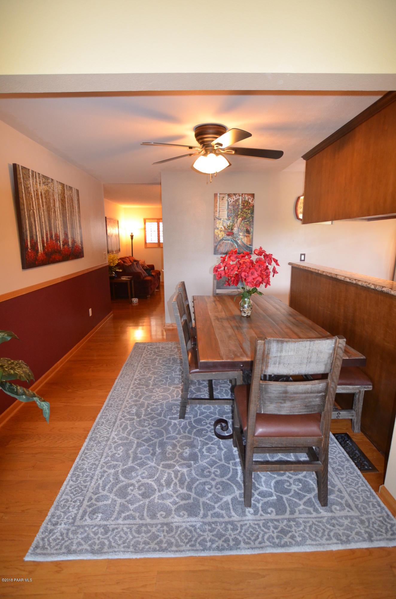 1251 Tanglewood Road Prescott, AZ 86303 - Photo 32 of 39 a living room with furniture and a rug