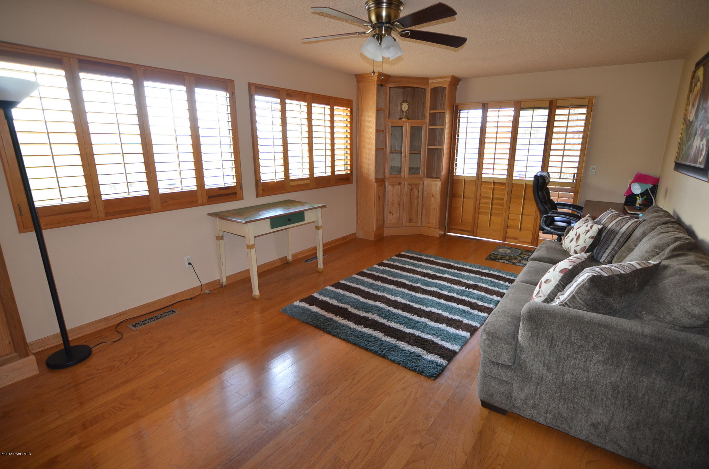 1251 Tanglewood Road Prescott, AZ 86303 - Photo 33 of 39 a room with furniture and windows