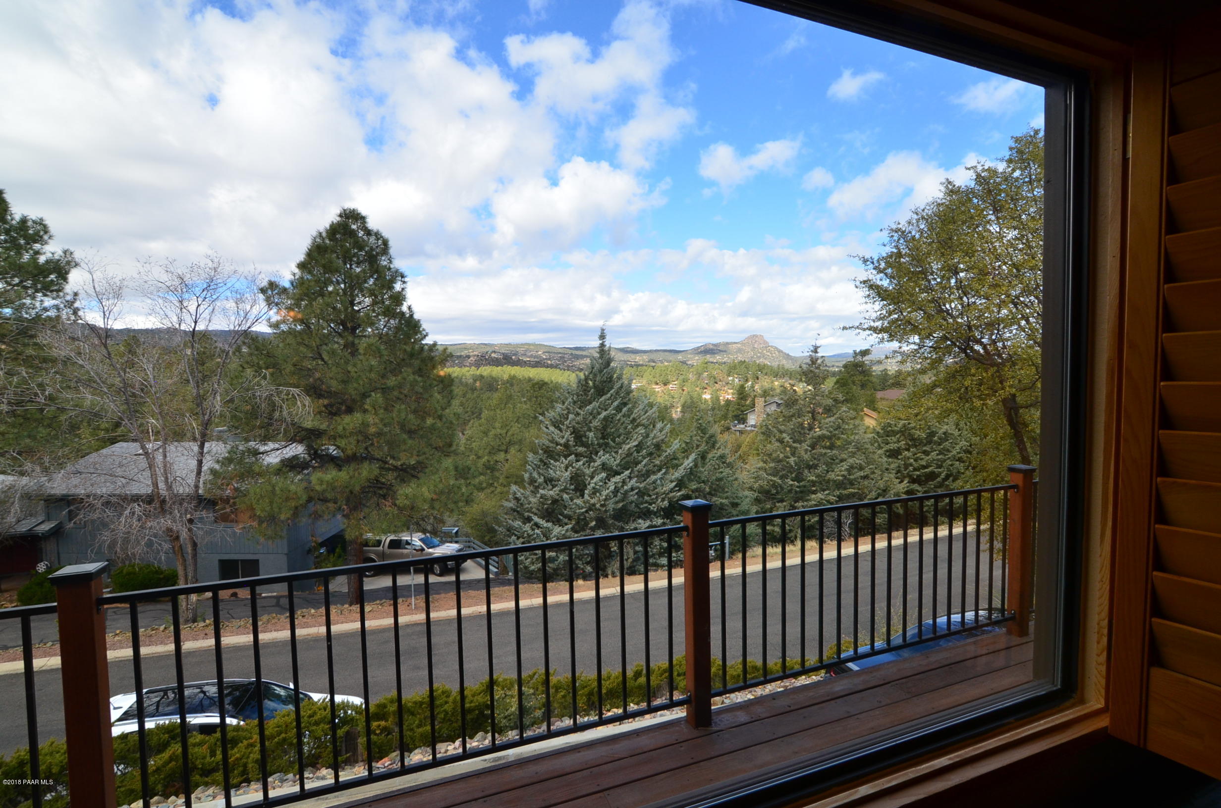 1251 Tanglewood Road Prescott, AZ 86303 - Photo 34 of 39 a view of a balcony with wooden fence