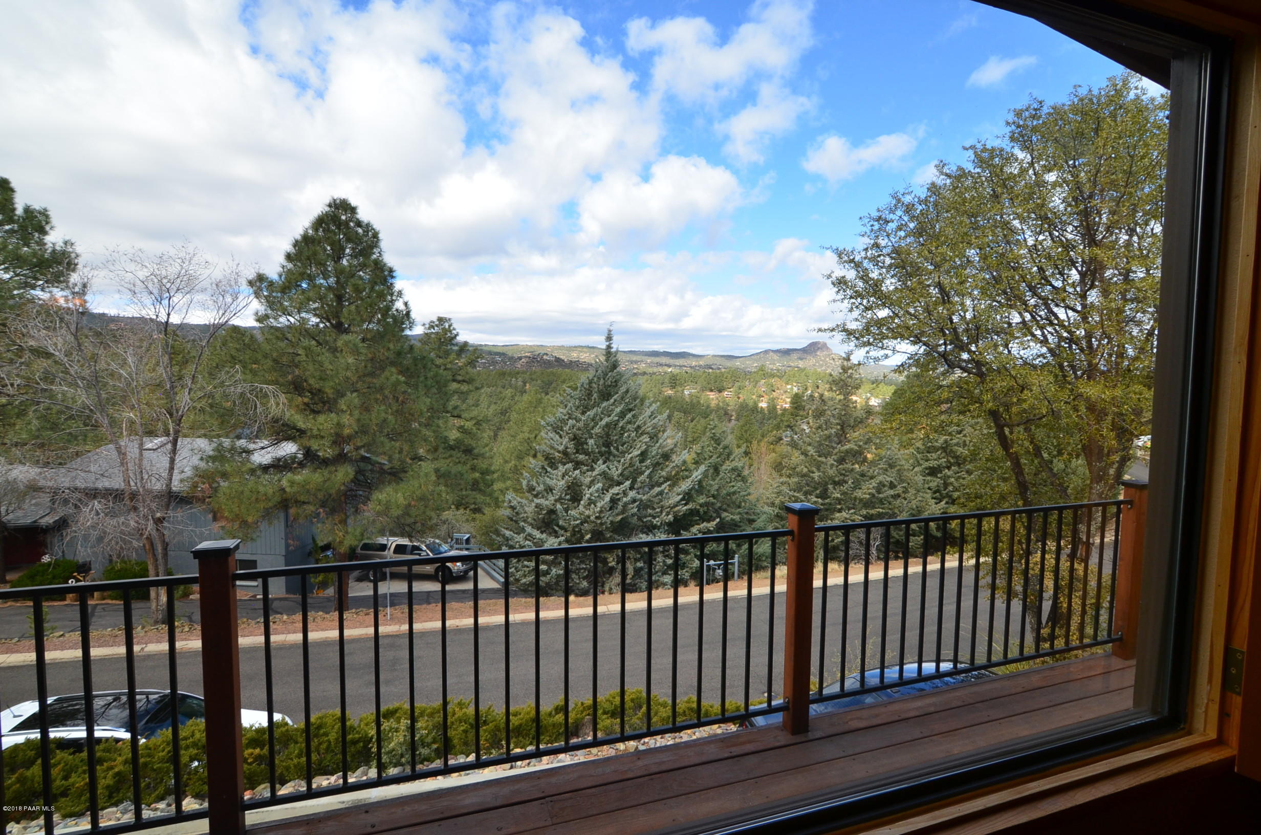 1251 Tanglewood Road Prescott, AZ 86303 - Photo 35 of 39 a view of a balcony with wooden fence