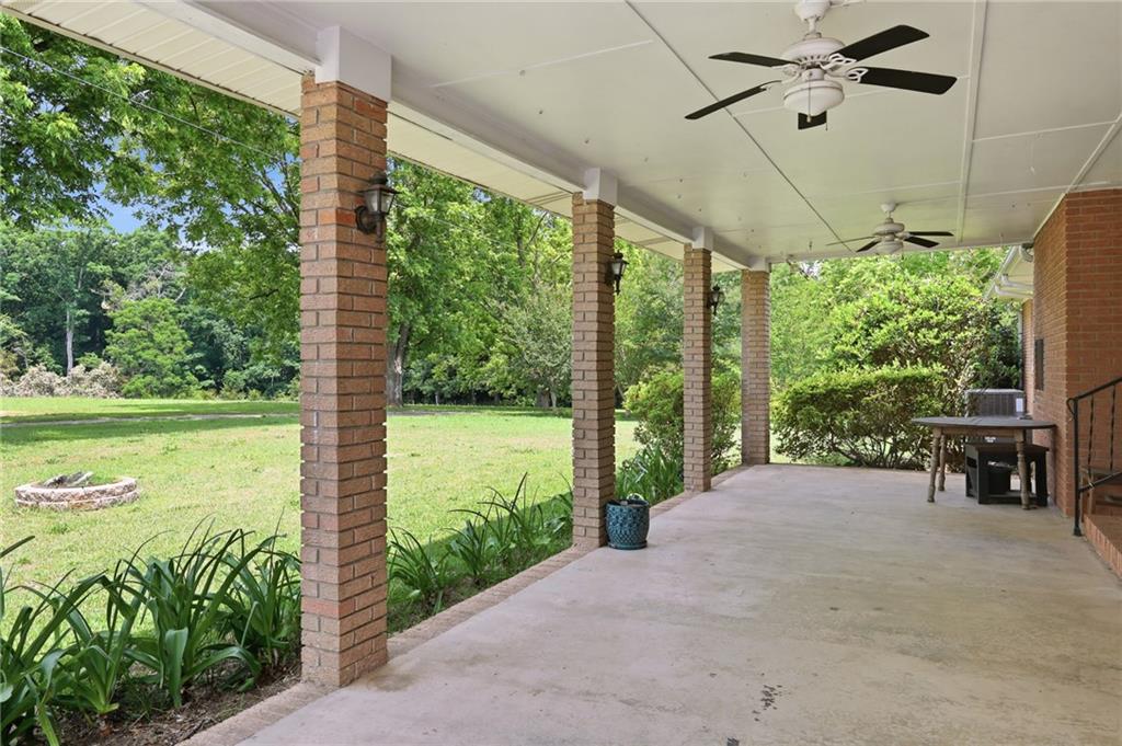 570 Wildcat Bridge Road Royston, GA 30662 - Photo 20 of 29 a view of a patio with a yard