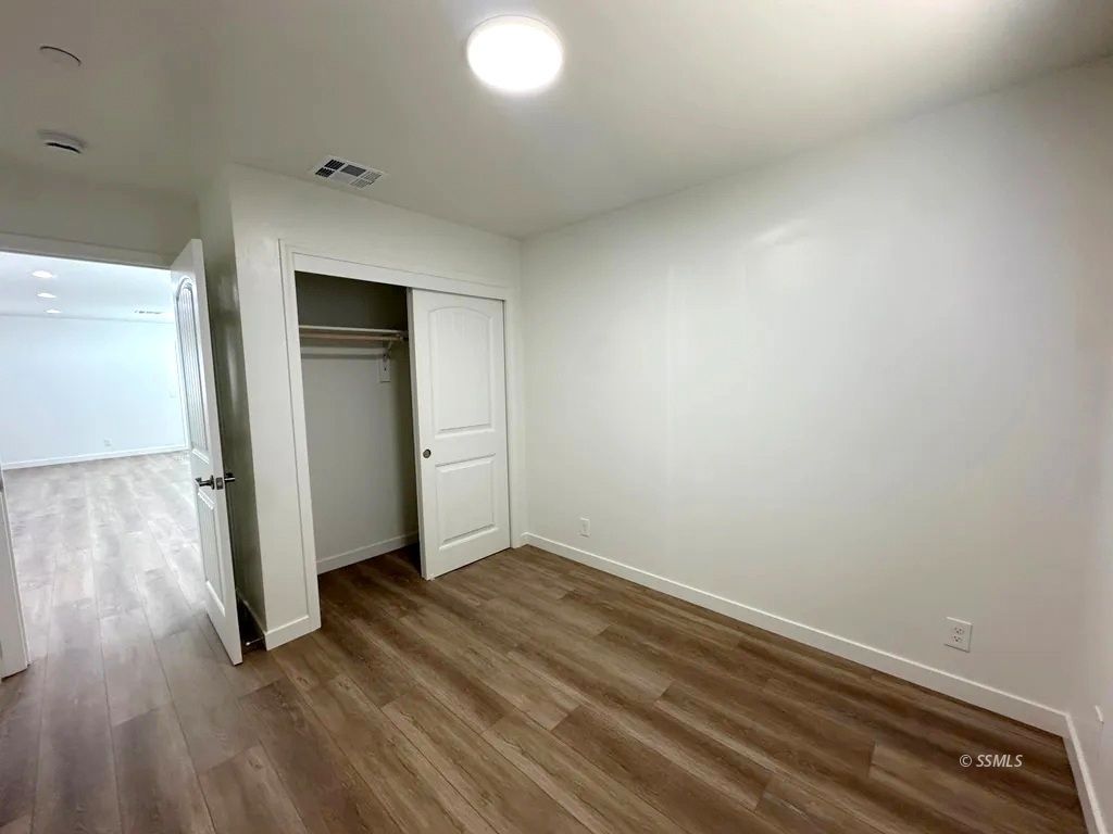 916 West Perdew Avenue Ridgecrest, CA 93555 - Photo 7 of 8 wooden floor in an empty room