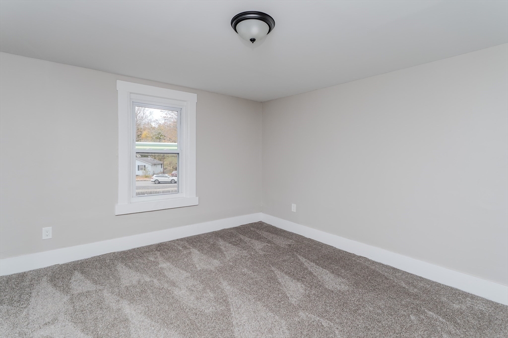 7 Webb Court Ware, MA 01082 - Photo 12 of 29 an empty room with windows
