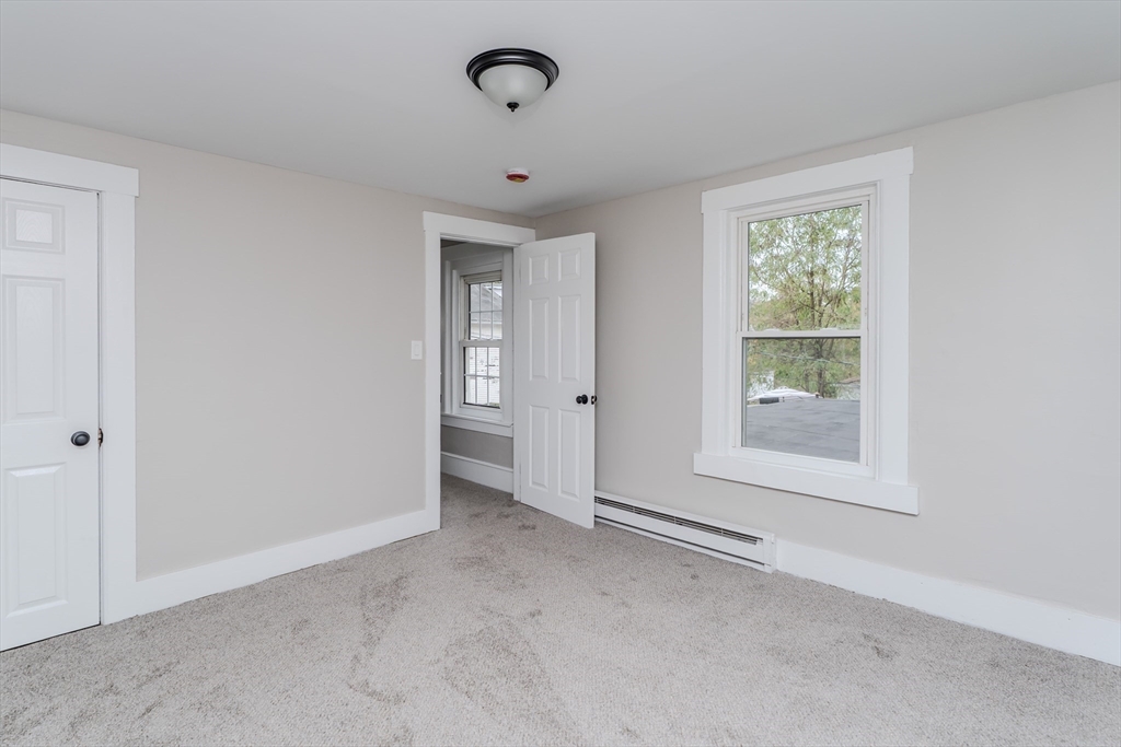 7 Webb Court Ware, MA 01082 - Photo 13 of 29 an empty room with windows