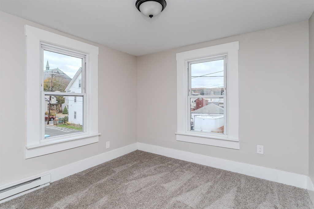 7 Webb Court Ware, MA 01082 - Photo 16 of 29 an empty room with windows