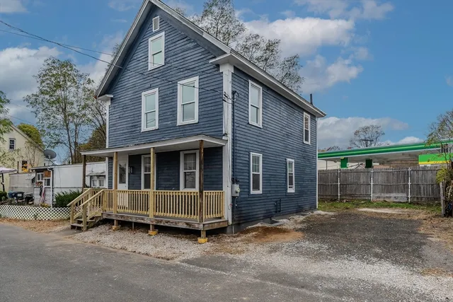 a car parked in front of a house