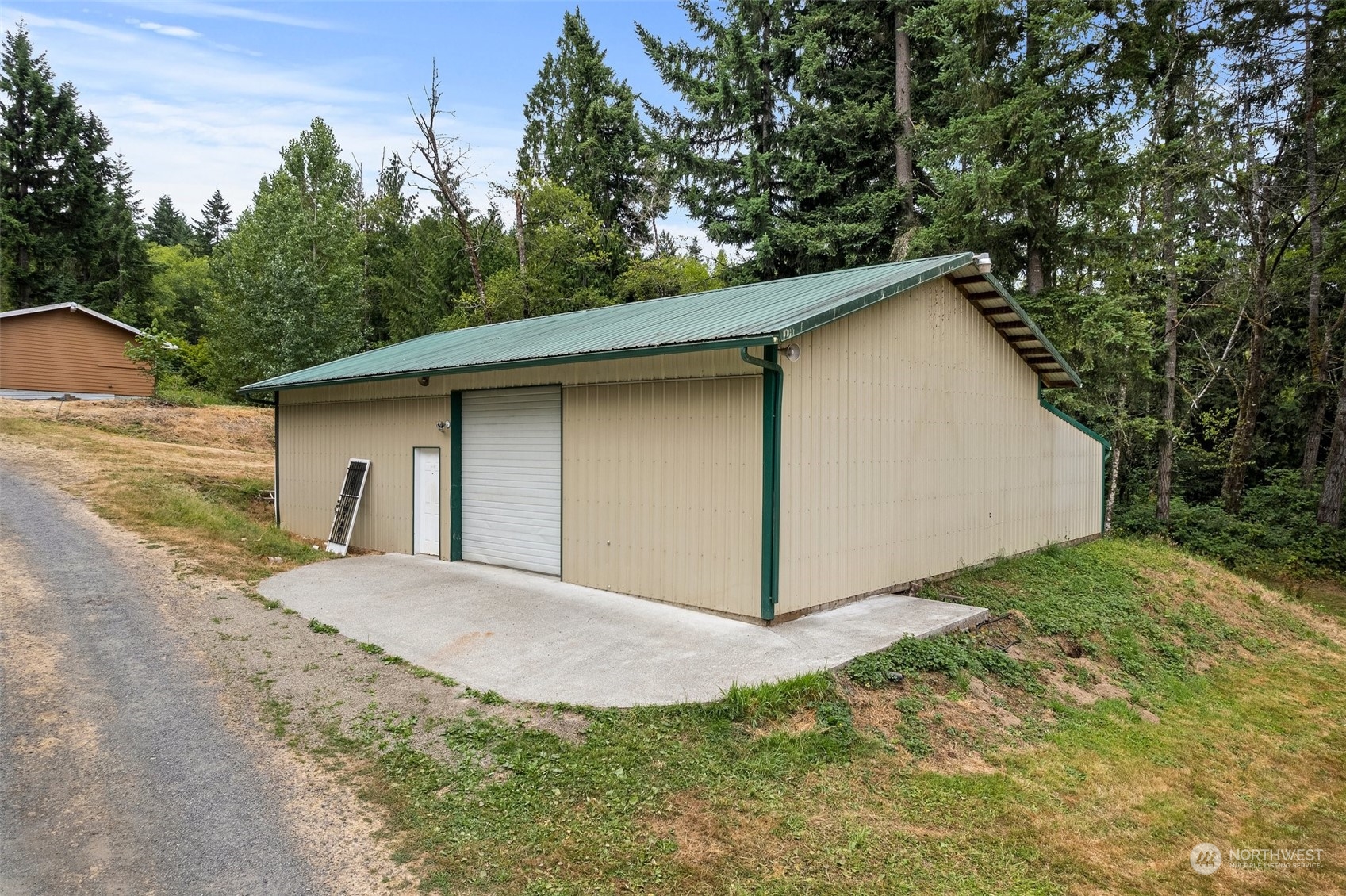 669 Twin Oaks Road Chehalis, WA 98532 - Photo 30 of 33 a view of a house with a yard and garage