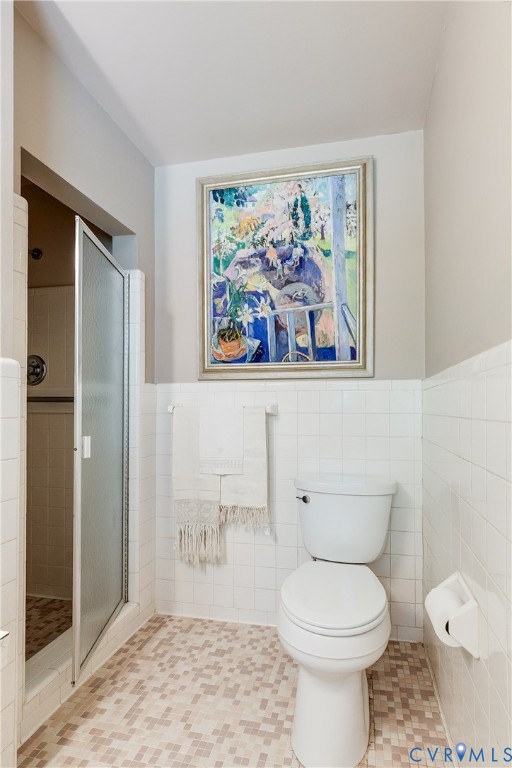 10475 Cherokee Road Richmond, VA 23235 - Photo 41 of 74 Bathroom featuring a walk-in shower with a frosted